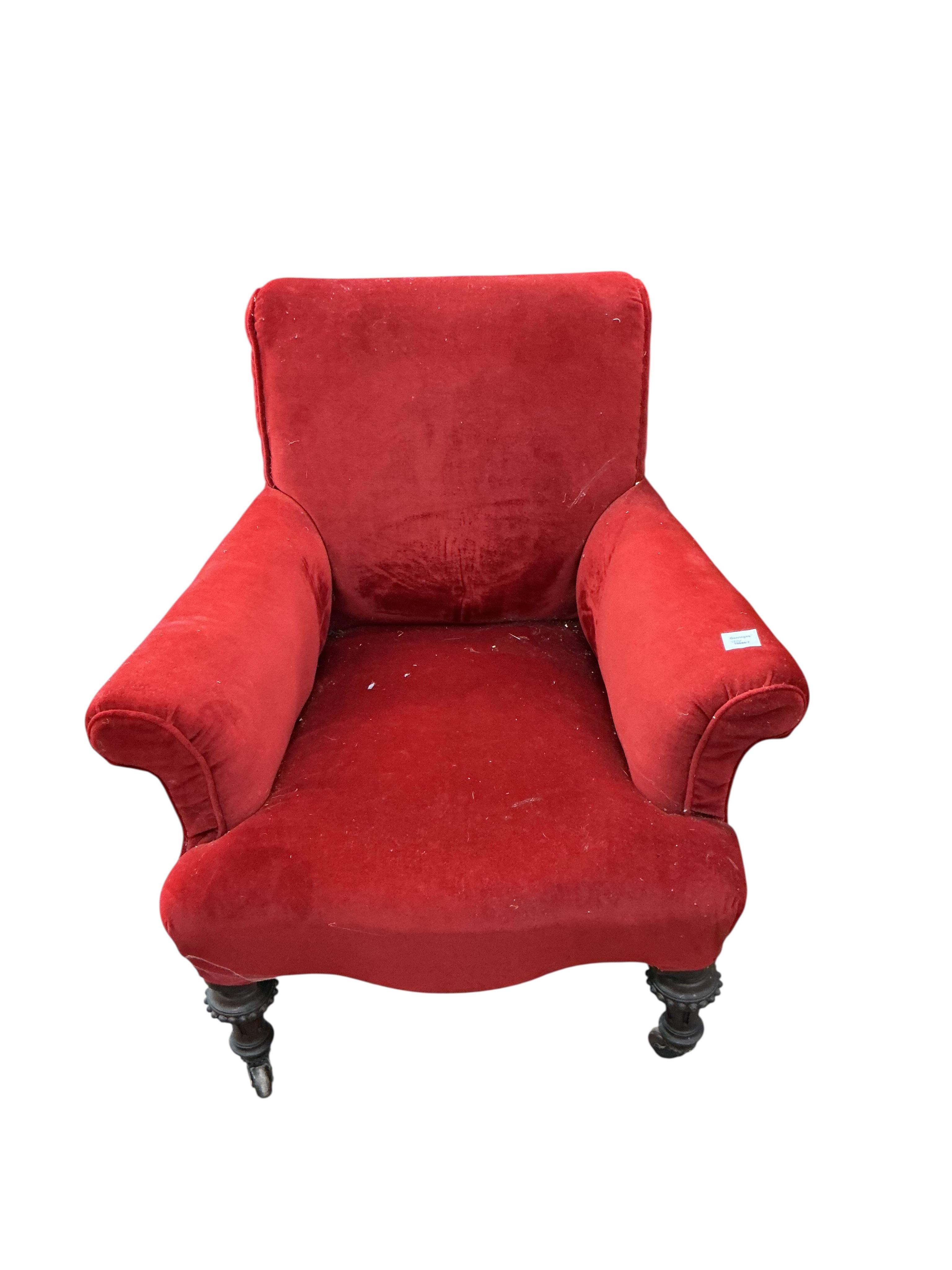 A Victorian upholstered armchair, width 84cm, depth 86cm, height 81cm
